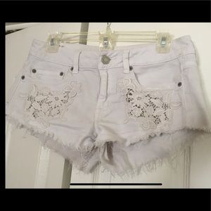 Hollister white floral embroidered jean shorts